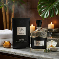 Creed Aventus Eau de Parfum for Men in a 3.3 oz bottle, featuring a sleek design and dark fragrance liquid.