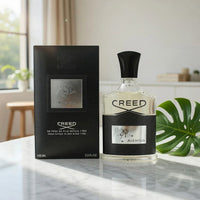 Spacewallart Creed Aventus Eau de Parfum for Men 3.3 oz bottle with sleek glass design and black cap, showcasing the fragrance.