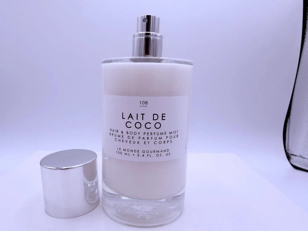 Spacewallart Le Monde Gourmand Lait de Coco Eau de Toilette 3.4 oz, featuring a sleek bottle with tropical coconut scent.