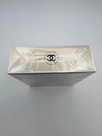 Chanel Gabrielle Eau de Parfum for Women in 3.4 oz bottle, elegant glass perfume bottle with a gold cap and floral design.