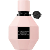 Viktor & Rolf Flowerbomb Extreme Eau de Parfum for Women in a glass bottle with floral design, displayed on a neutral background.