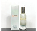 Bottle of La Mer The Halo Serum 1 oz / 30ml with sleek packaging, displaying the luxury skincare product on a neutral background.