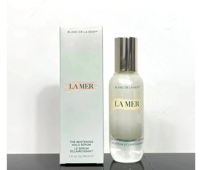 Bottle of La Mer The Halo Serum 1 oz / 30ml with sleek packaging, displaying the luxury skincare product on a neutral background.