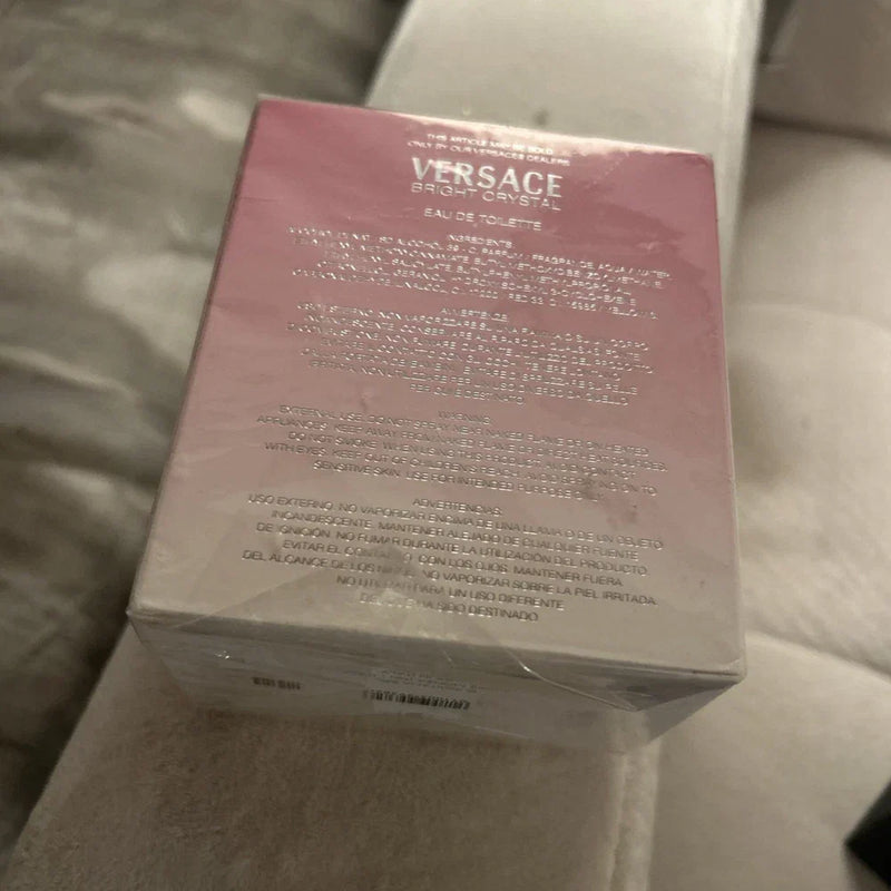 Elegant image of Versace Bright Crystal Eau de Toilette for Women in a 3 oz bottle, featuring a clear glass design with floral accents.