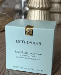 Estée Lauder Revitalizing Supreme+ Youth Power Creme anti-aging moisturizer in 2.5 oz jar, creamy texture, and elegant packaging.