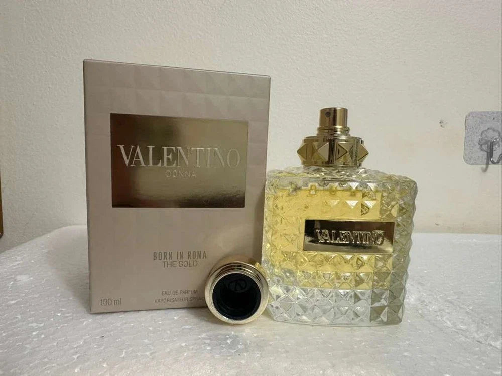 Valentino Born In Roma The Gold Donna Eau de Parfum bottle, 3.4 oz, sealed, with elegant gold design and branding.