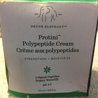 Drunk Elephant Protini Polypeptide Moisturizing Cream in 1.69 oz jar, featuring a smooth, creamy texture for skincare.
