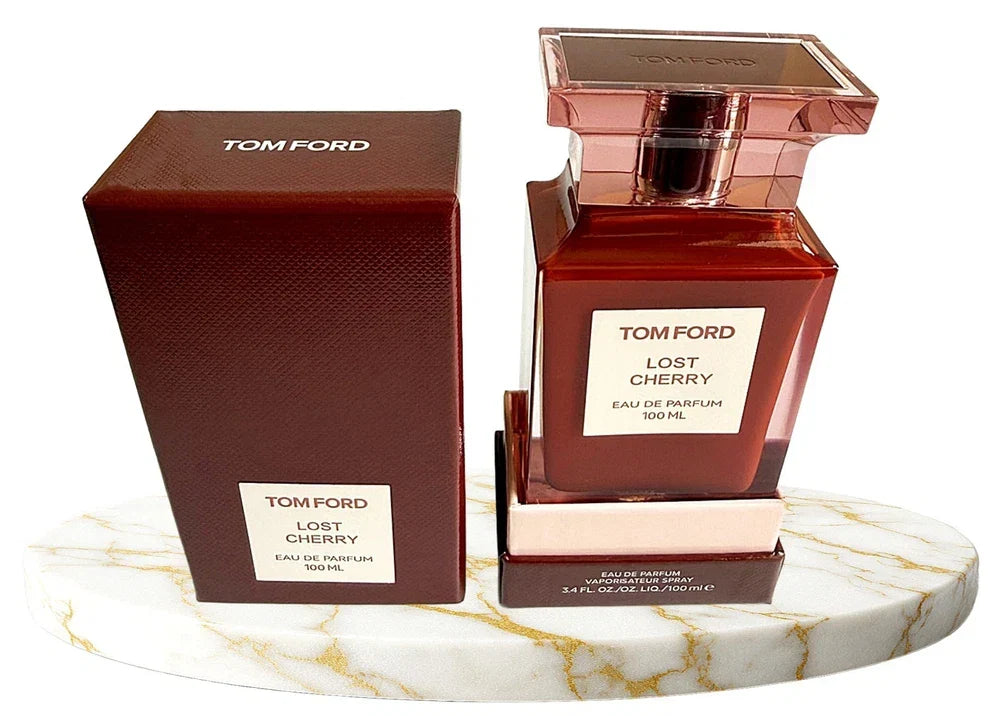 Tom Ford Lost Cherry Eau de Parfum unisex bottle with a sleek black design, 3.4 oz (100 ml), on a stylish background.