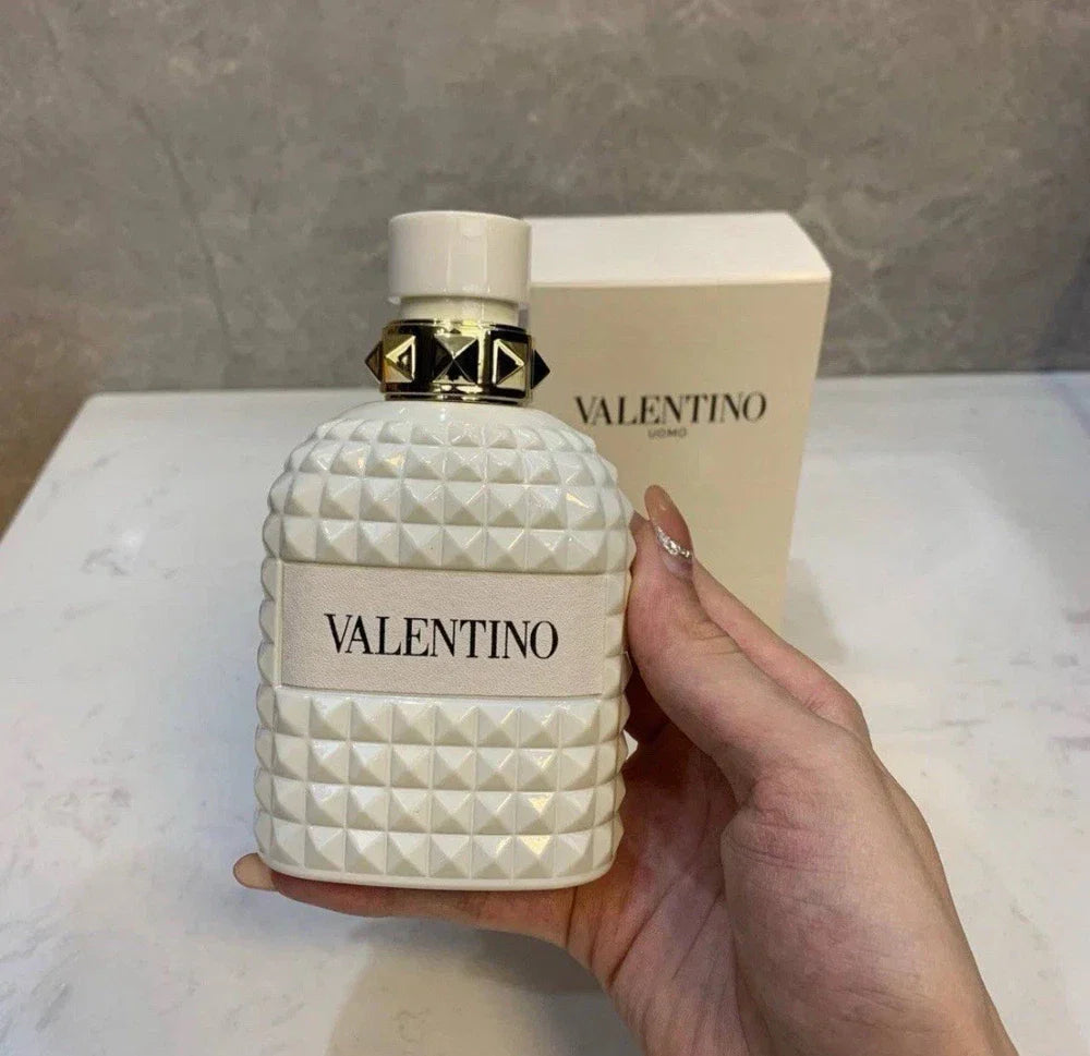 Valentino Uomo Born In Roma Ivory Eau de Toilette for Men, 3.4 oz, sealed bottle with sleek design and elegant branding.