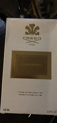 Creed Centaurus Eau de Parfum unisex bottle, 3.3 oz, with elegant packaging and minimalist design, by Spacewallart.