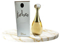 Christian Dior J'adore Eau de Parfum bottle for women, 3.4 oz, with elegant transparent glass and gold accents.