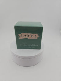 Spacewallart La Mer The Eye Concentrate 0.5 oz beauty product in a sleek jar, designed for eye skincare and anti-aging.
