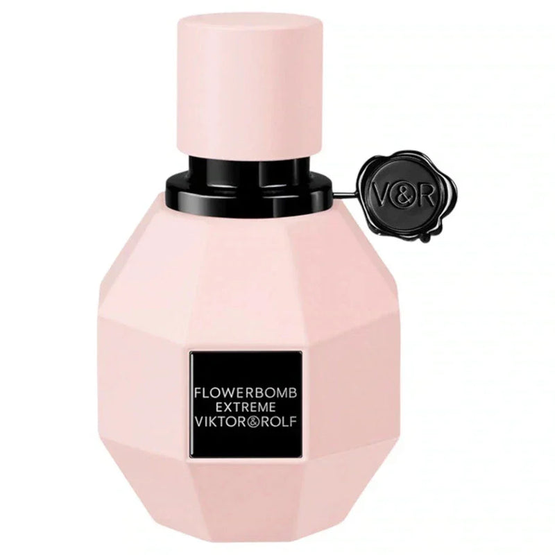 Viktor & Rolf Flowerbomb Extreme Eau de Parfum for women in a clear glass bottle with floral design, displayed on a white background.