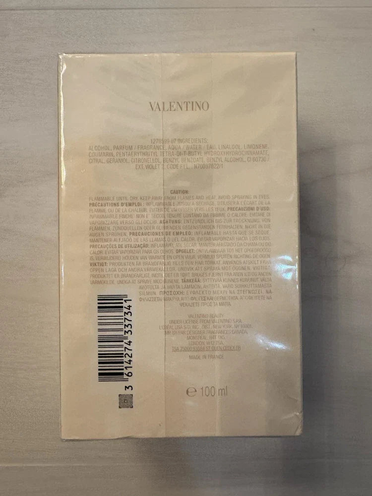 Valentino Uomo Born In Roma Ivory Eau de Toilette for Men in 3.4 oz bottle, sealed and new, featuring elegant packaging.