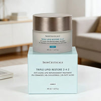 SkinCeuticals Triple Lipid Restore anti-aging face cream in a 1.6 oz jar, featuring rich, nourishing skincare for youthful skin.