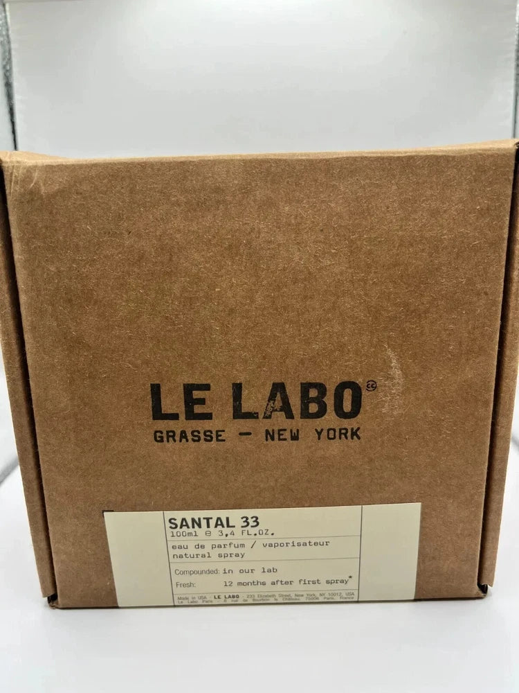 Le Labo Santal 33 Eau de Parfum unisex bottle with minimalist design, 3.4 oz, displayed on a neutral background.