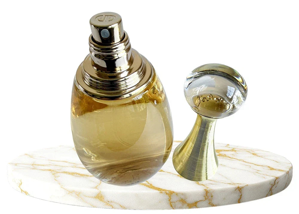 Christian Dior J'adore Eau de Parfum for Women in 3.4 oz bottle, featuring elegant glass design and gold accents.