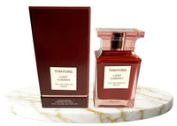 Tom Ford Lost Cherry Eau de Parfum unisex bottle with 3.4 oz size, featuring a sleek design and luxurious fragrance presentation.
