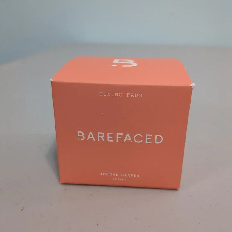 Spacewallart Barefaced Toning Pads exfoliating face pads, 60-count, shown with textured surface for gentle skin exfoliation.
