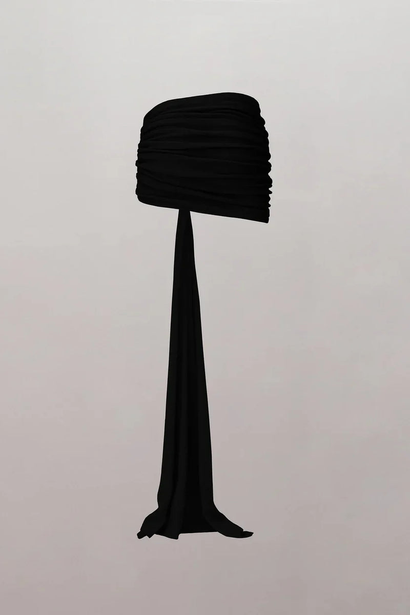 Spacewallart wrapped in Merino knitted mini skirt, showcasing a stylish, cozy apparel piece with a textured wool design.